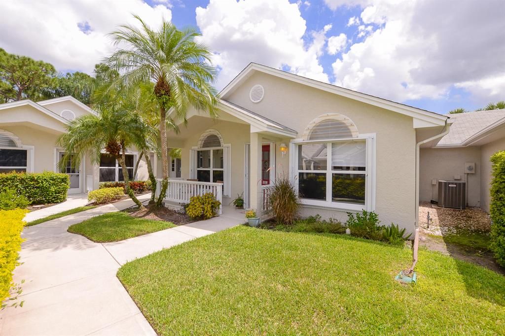 Photo of 1103 NW Lombardy Drive, Port Saint Lucie, FL 34986 (MLS # R10744097)