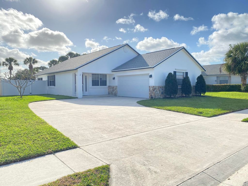 Photo of 125 Raintree Trail, Jupiter, FL 33458 (MLS # R10779187)