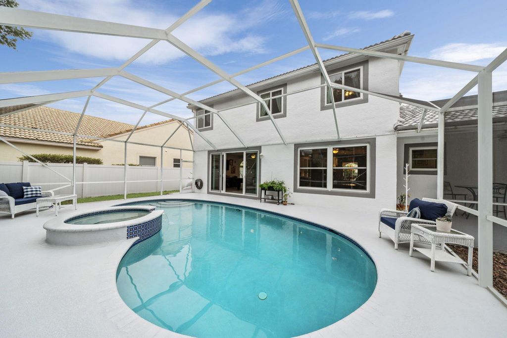 Photo of 10292 Allamanda Boulevard, Palm Beach Gardens, FL 33410 (MLS # R10965519)