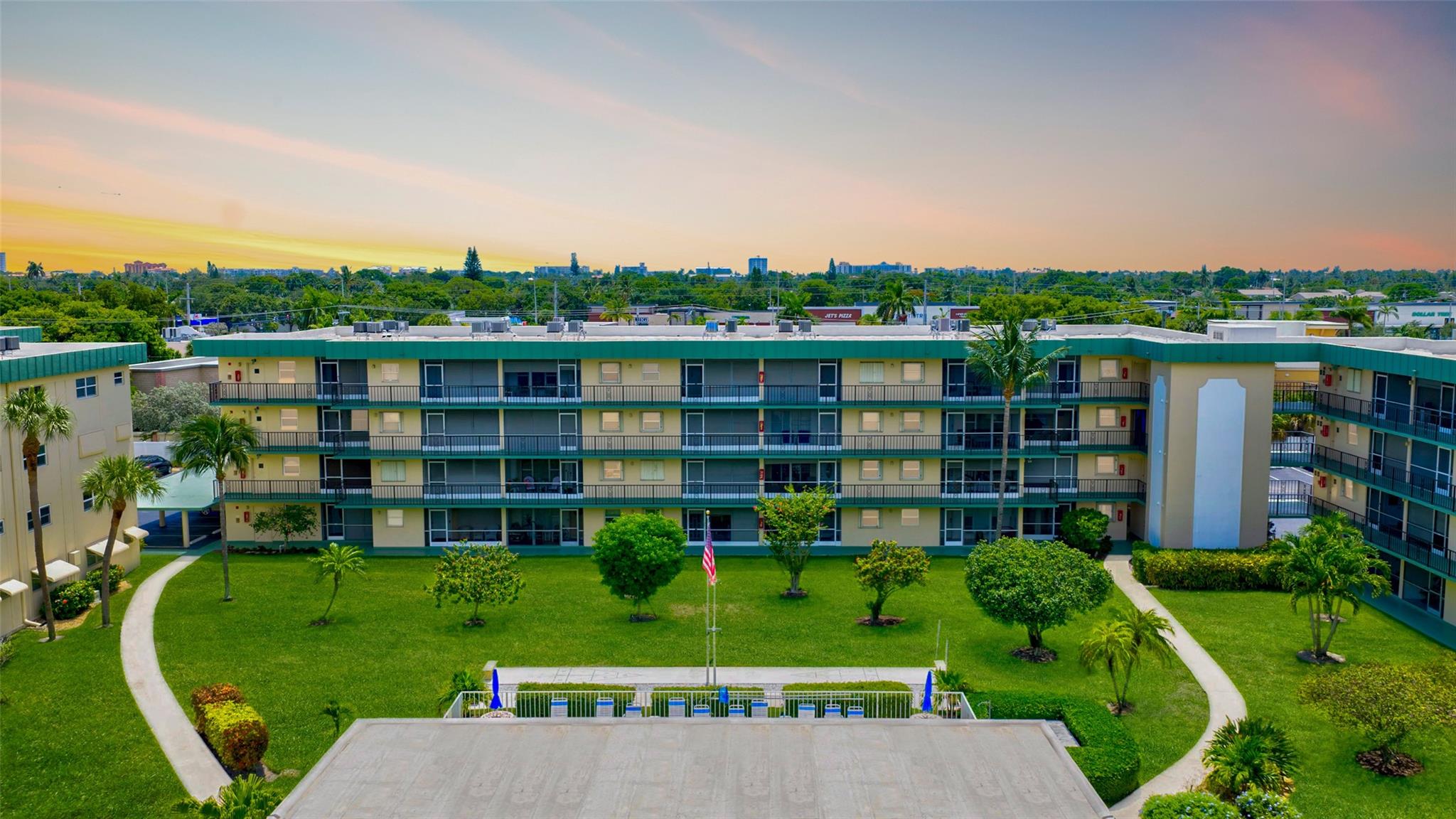 This beautiful first-floor condo is just 1.5 miles from the beach & is move-in ready! Enjoy your morning coffee or afternoon cocktail overlooking lush gardens & the sparkling pool—your actual view right outside. Inside, you’ll love the recent renovations, including a stunning waterfall countertop w/ extra seating, built-in wine cooler, & added storage. The condo features 2 spacious bedrooms and 2 updated bathrooms. The primary suite easily fits a king-sized bed, desk, & bench, & natural light floods every room. No popcorn ceilings here—just a fresh, modern feel throughout. The community offers a heated pool, shuffleboard, a clubhouse for social gatherings, & conveniently located laundry facilities. You don't want to miss out on a condo like this! Stay friendly.