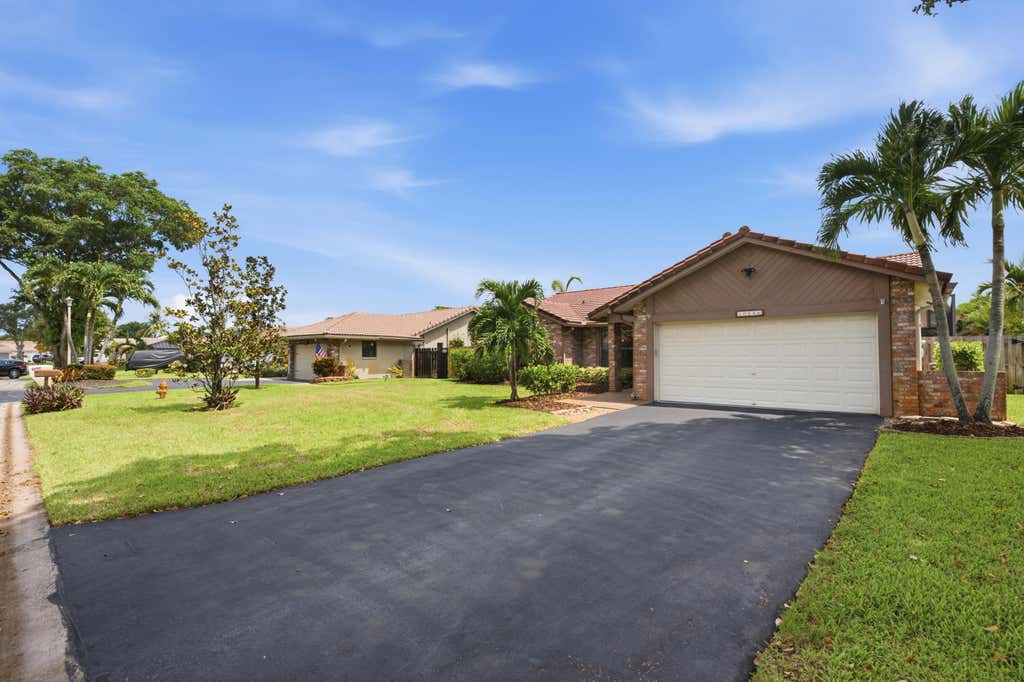 Photo of 10666 NW 2ND Place, Coral Springs, FL 33071 (MLS # B26068318)