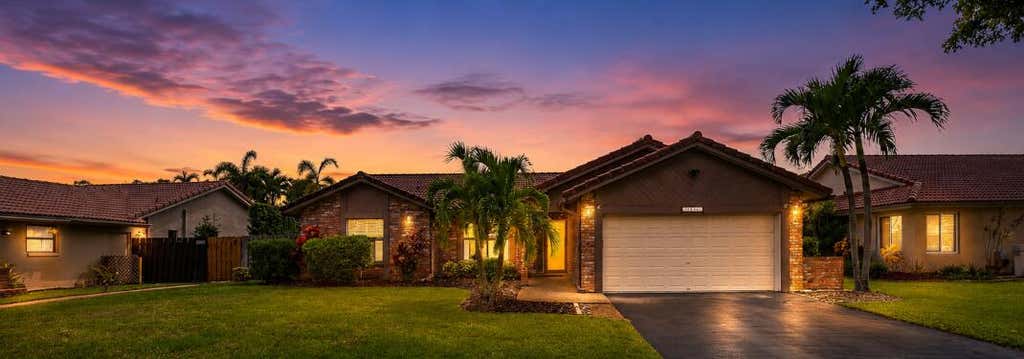 Photo of 10666 NW 2ND Place, Coral Springs, FL 33071 (MLS # B26068318)
