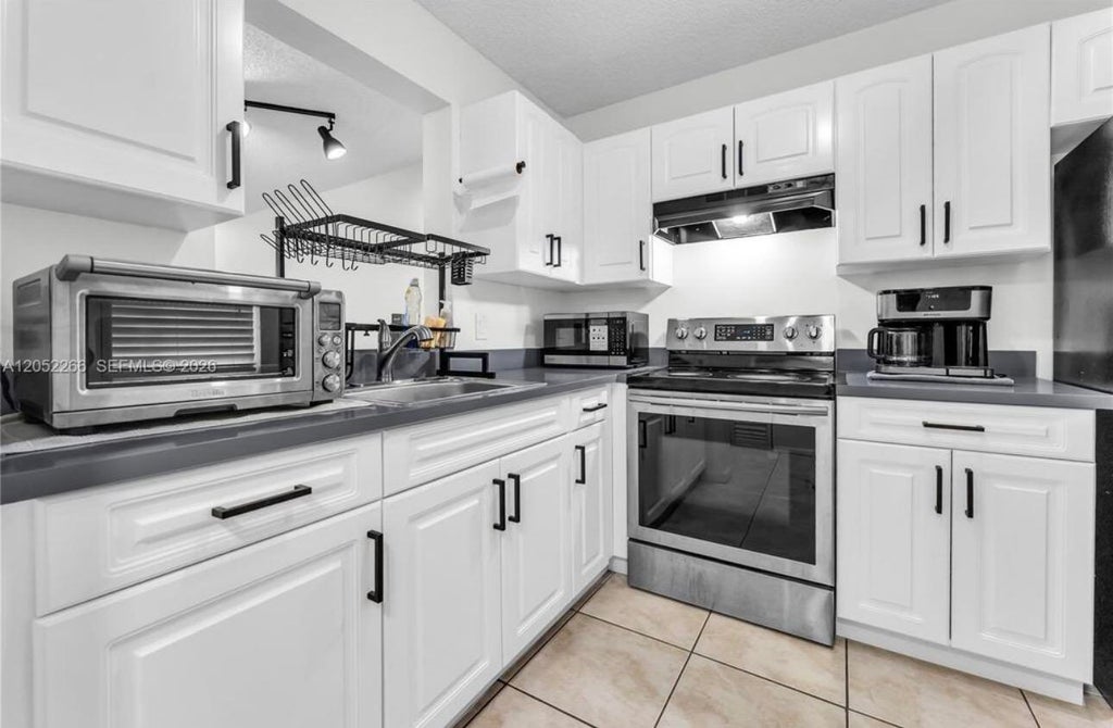 Photo of 8720 N SHERMAN Circle #101, Miramar, FL 33025 (MLS # B26092244)