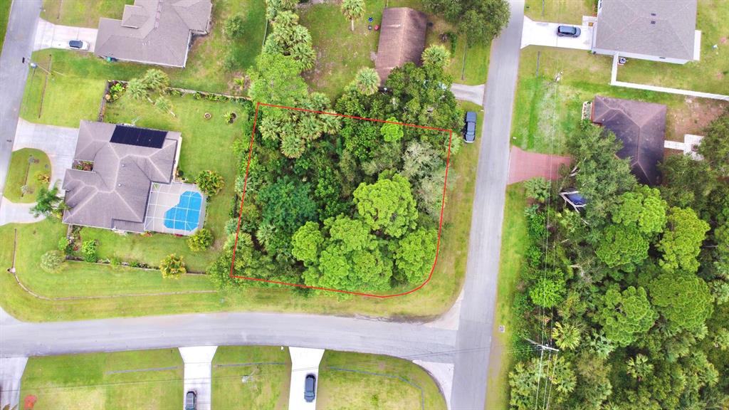 Build Your Dream Home! Best-priced lot of its kind in a highly desirable area of Port Saint Lucie. Oversized CORNER lot on a quiet street with minimal through traffic. Great neighborhood with newer homes and easy access to both Turnpike and I-95. This one won't last long... Bring Your Highest and Best!