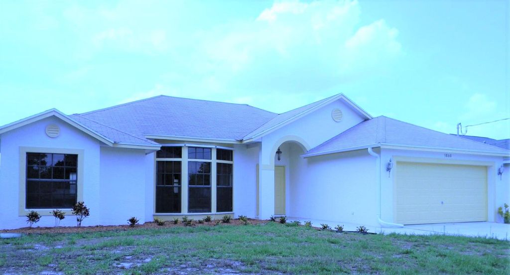 Photo of 5860 NW Dunmore Avenue, Port Saint Lucie, FL 34986 (MLS # R10789761)