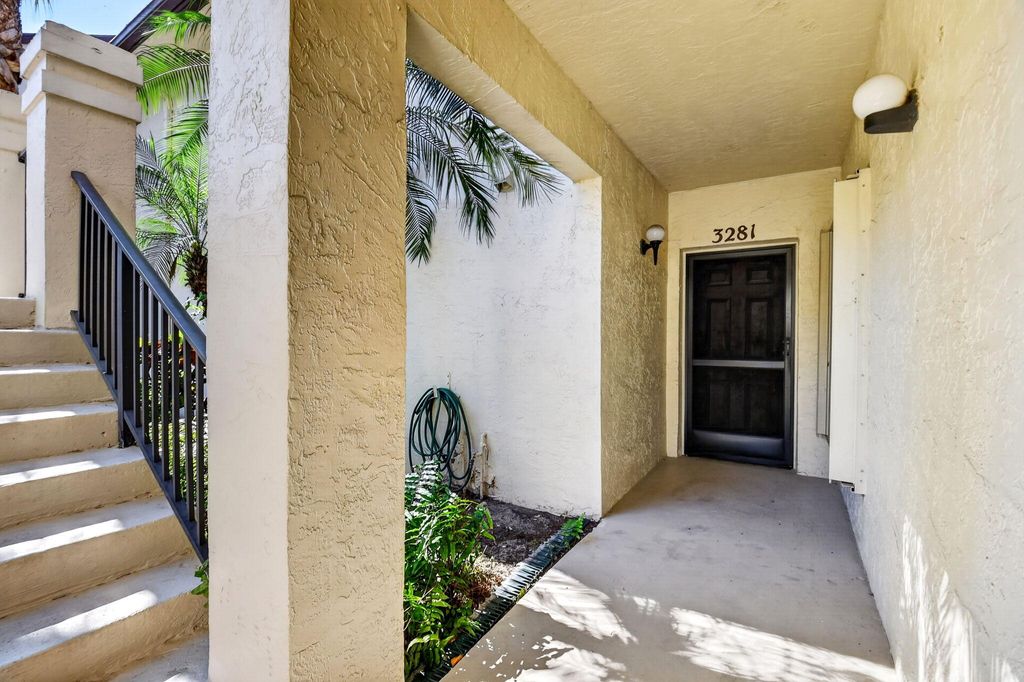 Photo of 3281 Jog Park Drive, Greenacres, FL 33467 (MLS # B26030030)