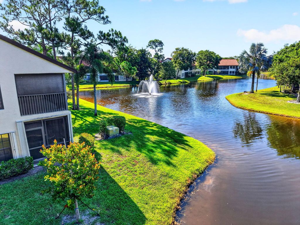 Photo of 3281 Jog Park Drive, Greenacres, FL 33467 (MLS # B26030030)