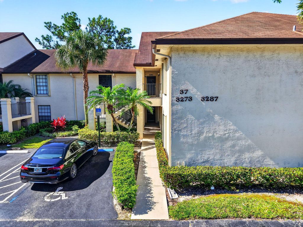Photo of 3281 Jog Park Drive, Greenacres, FL 33467 (MLS # B26030030)