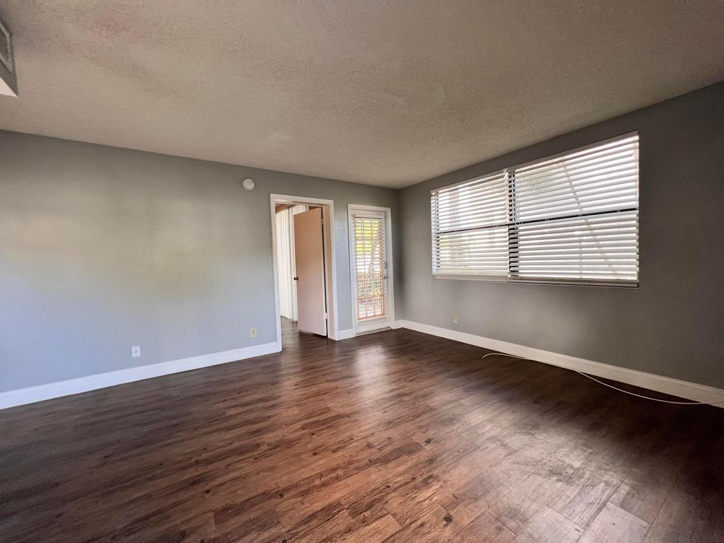 Photo of 718 Executive Center Drive #111, West Palm Beach, FL 33401 (MLS # B26027557)