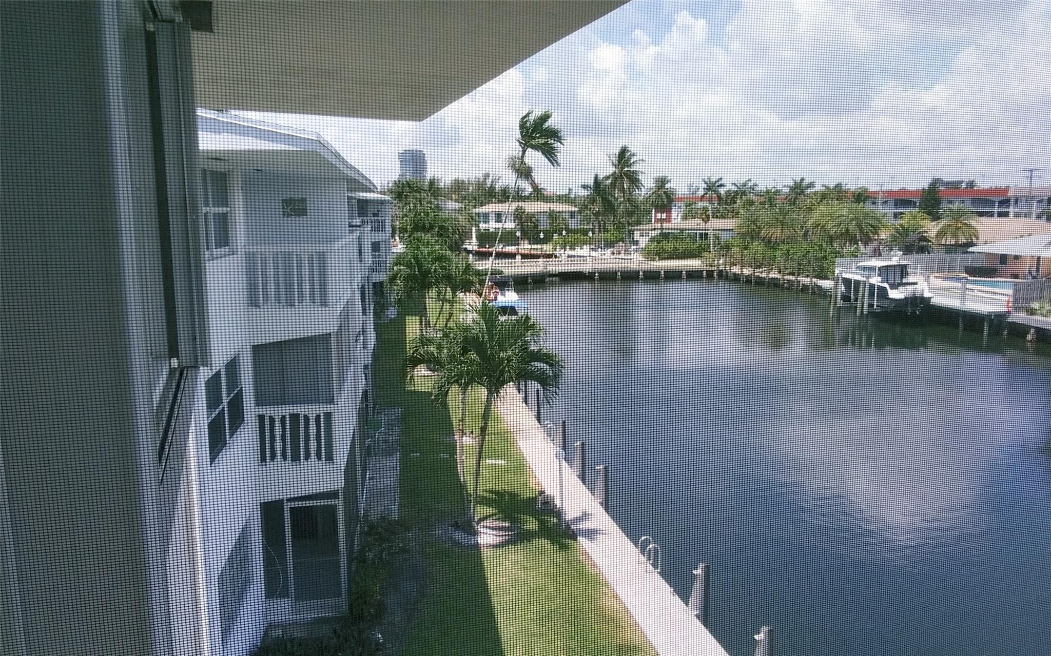 Live In Paradise! Amazing Short Term(3-4mo)Rental On A Private Island! Top Floor 2/2 W/Wrap-Around Water View..Watch Beautiful Sunsets On A Screened -In Balcony..Fully Furnished (Just Bring Clothes!) Featuring Italian Leather Sofas..65" TV,Kitchen Breakfast Bar..Sofa/Bed In Guest Room, Tinted Sliding Door..Roll Down Hurricane Shutters..Park Right Outside Door..Cable/Water/Garb/Exterm Included! Heated Community Pool W/Clubhouse & BBQ Area! Minutes To Beaches,Restaurants,Shopping,Casinos,Villages Of Gulfstream & More! 55+ Bldg..Unit Is Also For Sale/Tenant Must Allow Showings W/24 Hr Notice.. Don't Miss This One!