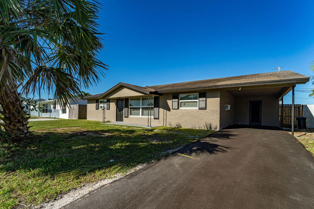 Beautifully renovated, 4 BR, 2 BA single family home in the heart of Palm Beach Gardens. This home has luxury vinyl through out, a living room, eat in kitchen a family room off the kitchen. Both bathrooms are new. The private fenced back yard is perfect for play and pets. Pets allowed. Large dogs OK. Breed on a case by case basis. 650 Min credit score. Tenant must carry renters insurance with $100,000 liability naming landlord additional insured.