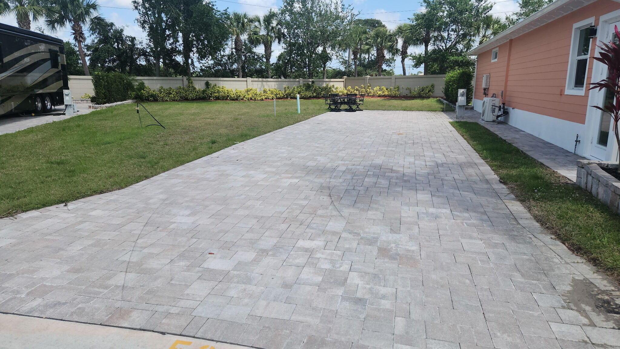 Motorcoach Resort at St Lucie West! One of the last lots in Phase III just waiting for a Casita home or improvements to mate it your dream lot for your Class A Motorcoach. Paver pad and utilities are already in place. Large grassy area with privacy wall. 18 hole golfing, pools, hot tubs, pickleball, tennis, dog parks are just a few of the amenities offered as well as a fantastic social and activity calendar! Year round endless summer!