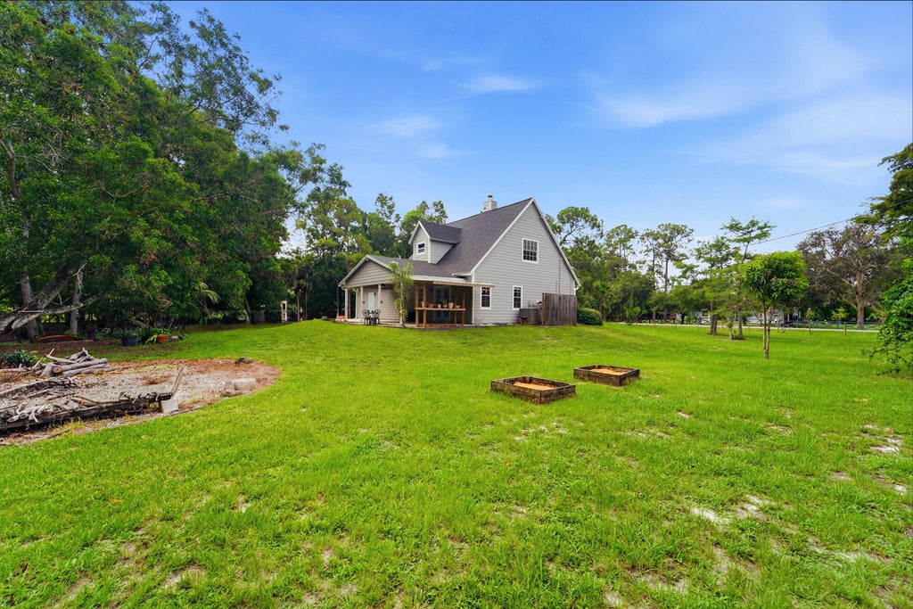 Photo of 16317 Glasgow Drive E, The Acreage, FL 33470 (MLS # B26039902)
