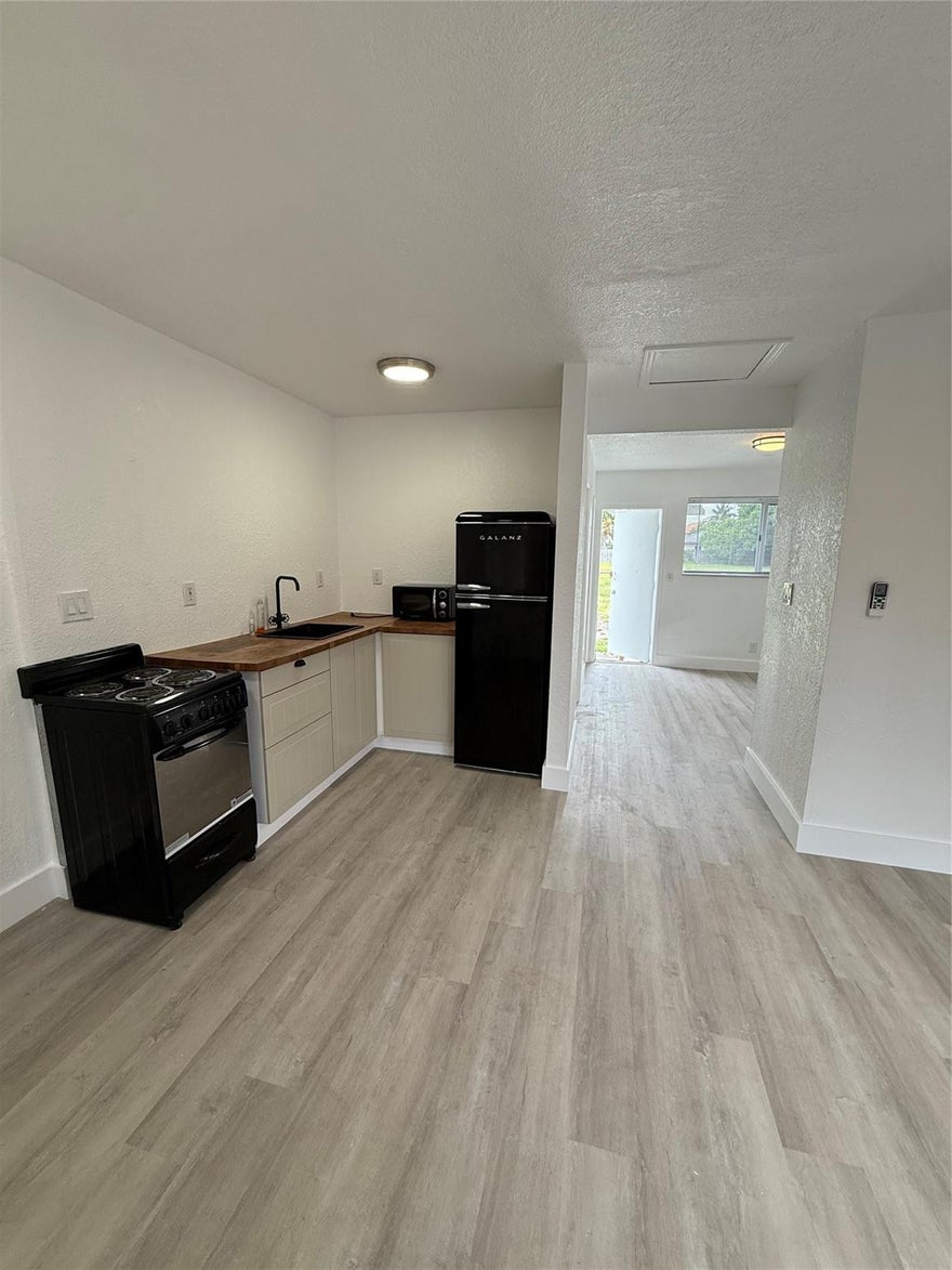 This stunning unit has been freshly renovated. Recent upgrades include newly installed floors, fresh interior paint, a modernized shower, and a brand-new AC unit. The roof is just 3 years old. Perfectly located just minutes from the beach and Hollywood Circle, and directly across from Beachside Montessori Village School.