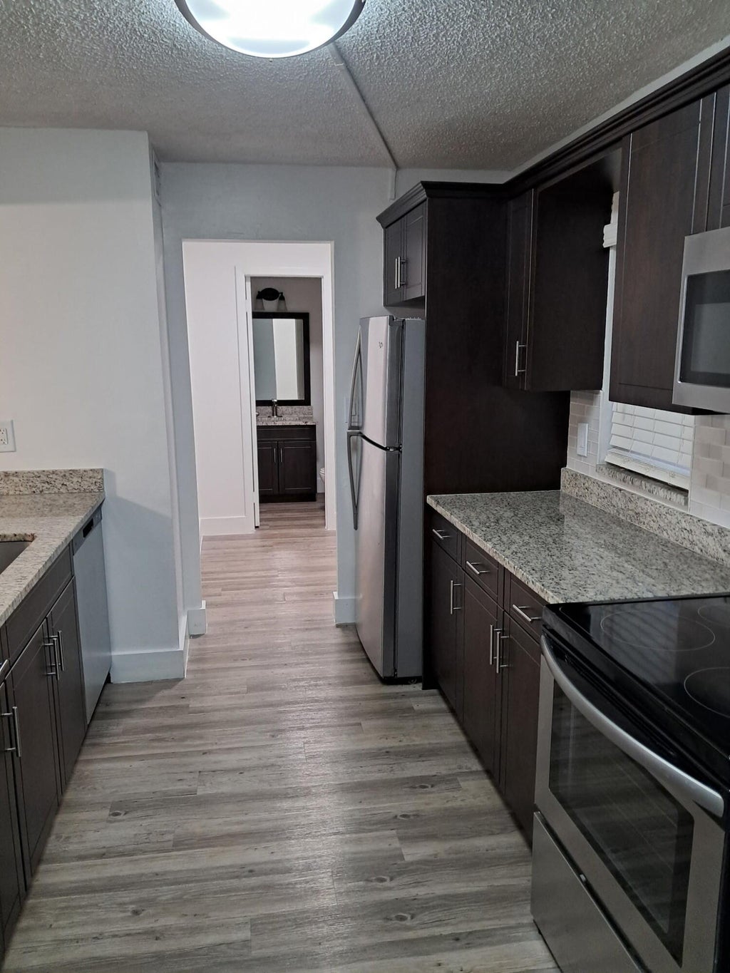 Photo of 3100 N PINE ISLAND Road #210, Sunrise, FL 33351 (MLS # B26075833)