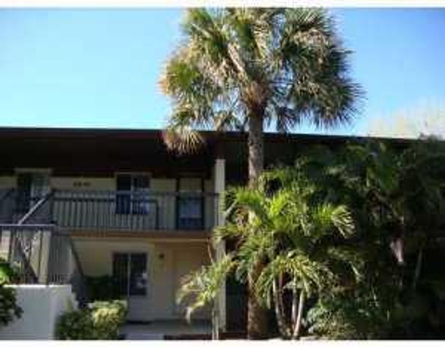 New carpet and paint. 2nd floor with vaulted ceiling, split bedroom, open floor plan, screened in patio with utility closet.  2 assigned parking spaces, basic cable and water included in condo fee. Community offers, pool, tennis courts, private lot for parking boat or RV. Motivated seller. Taxes are not Homestead, EZ to see.