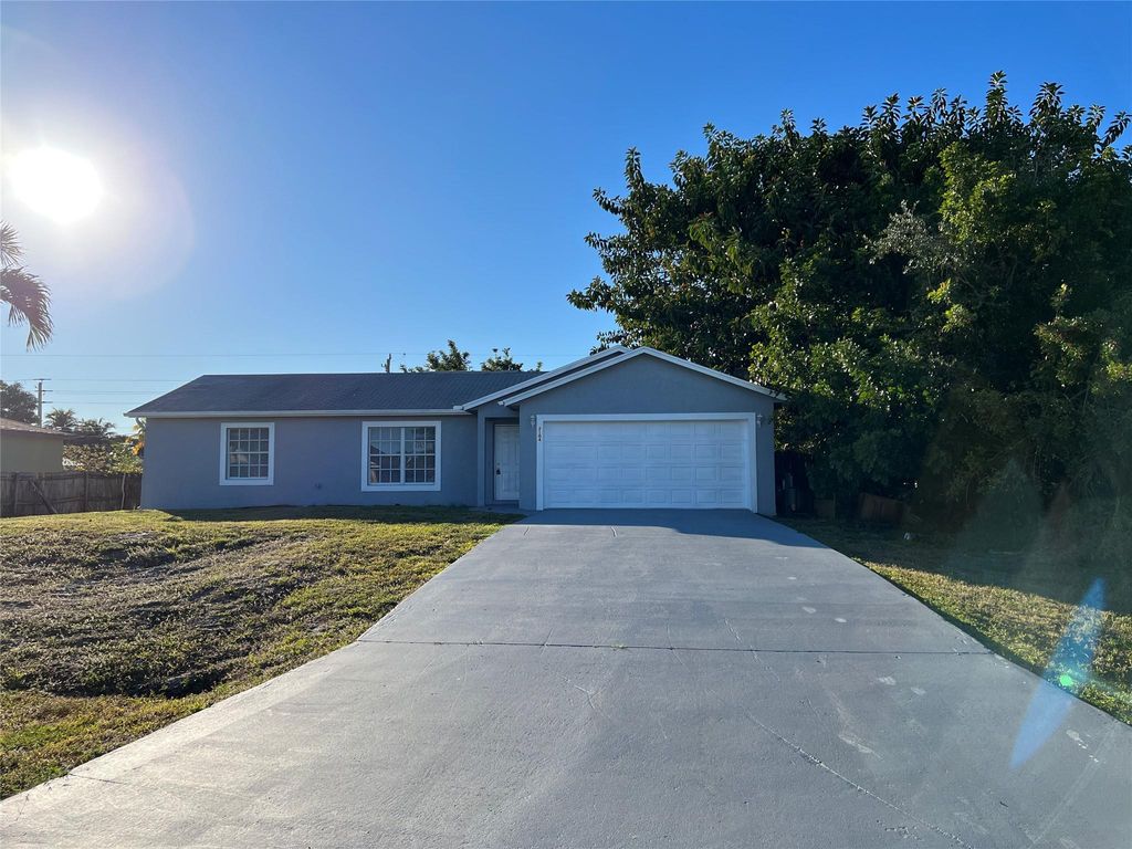 Photo of 2104 SE Stargrass Street, Port Saint Lucie, FL 34984 (MLS # F10423817)