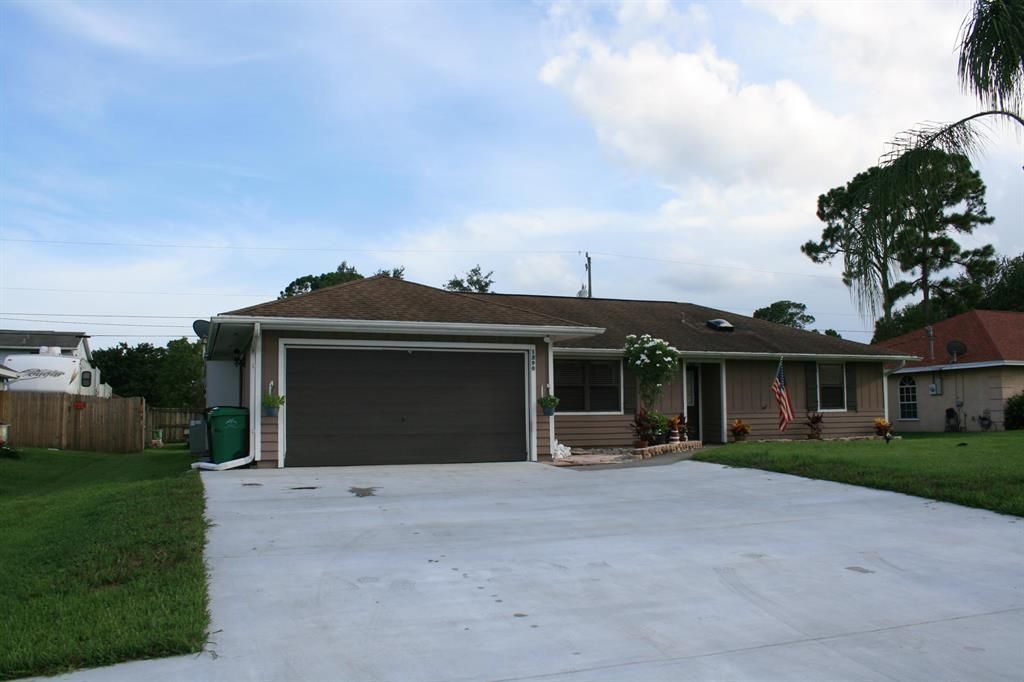 Photo of 1290 SW Century Avenue, Port Saint Lucie, FL 34953 (MLS # R10729577)