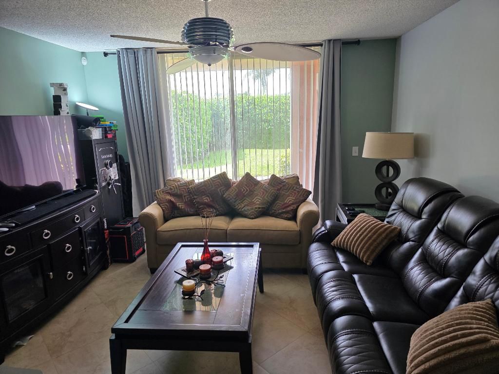 Photo of 7824 Sonoma Springs Circle #104, Lake Worth, FL 33463 (MLS # R11110427)