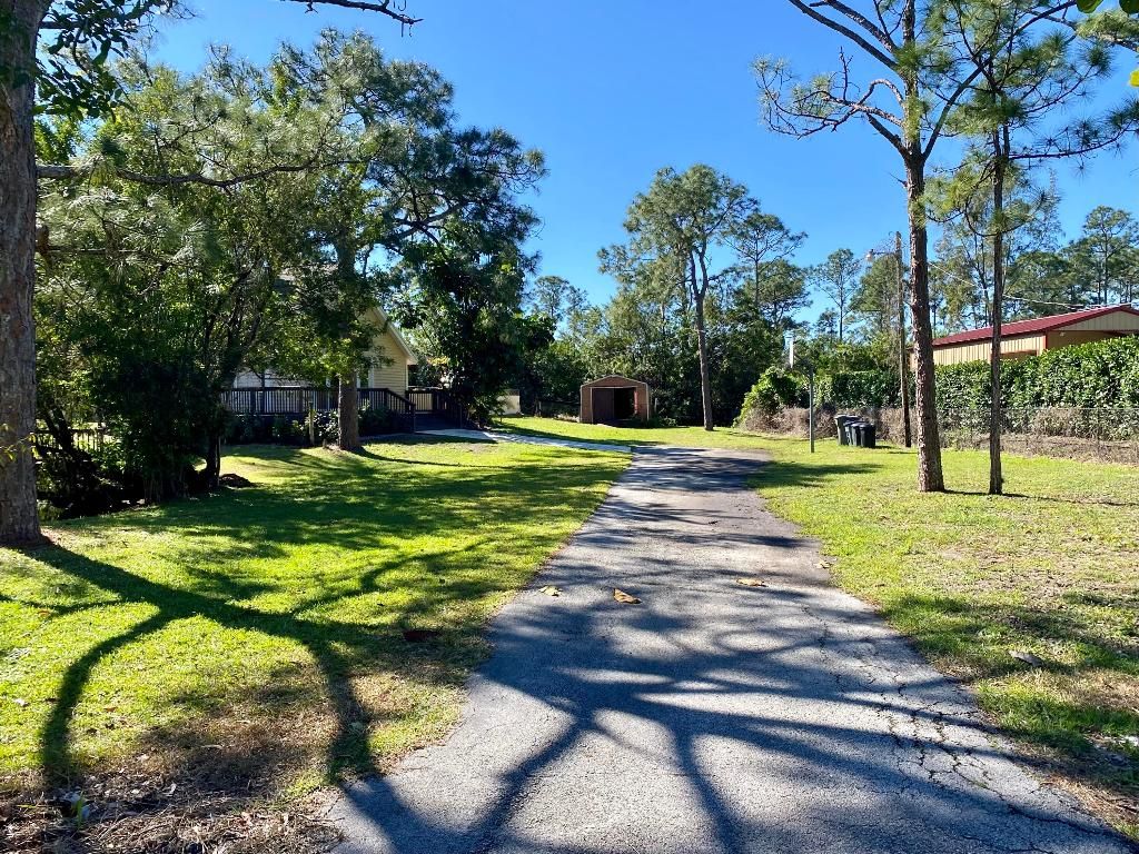 Photo of 10332 150 Court N, Jupiter, FL 33478 (MLS # R10961460)