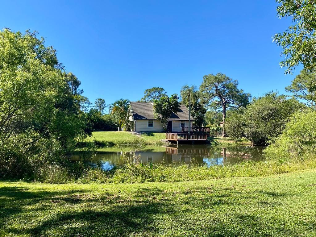 Photo of 10332 150 Court N, Jupiter, FL 33478 (MLS # R10961460)