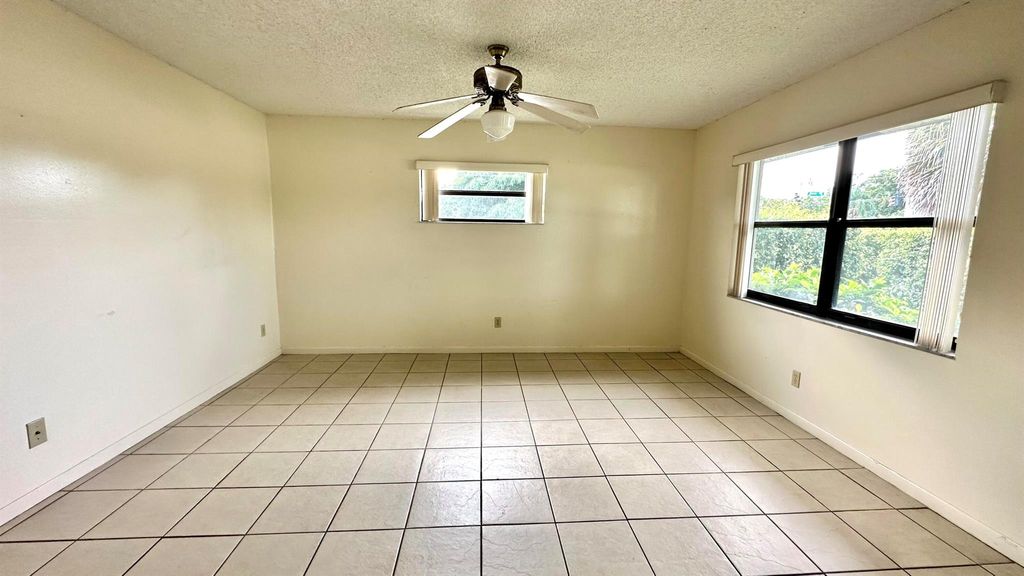 Photo of 3523 Melaleuca Lane, Lake Worth, FL 33461 (MLS # R11148579)