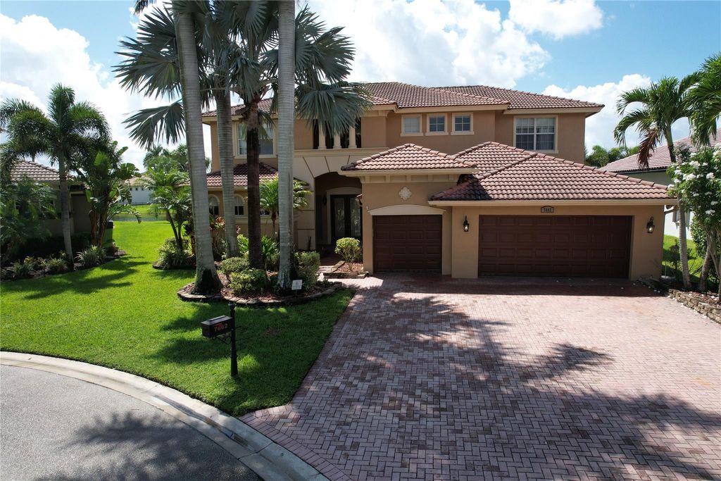 Photo of 7662 NW 127th Manor, Parkland, FL 33076 (MLS # F10472657)