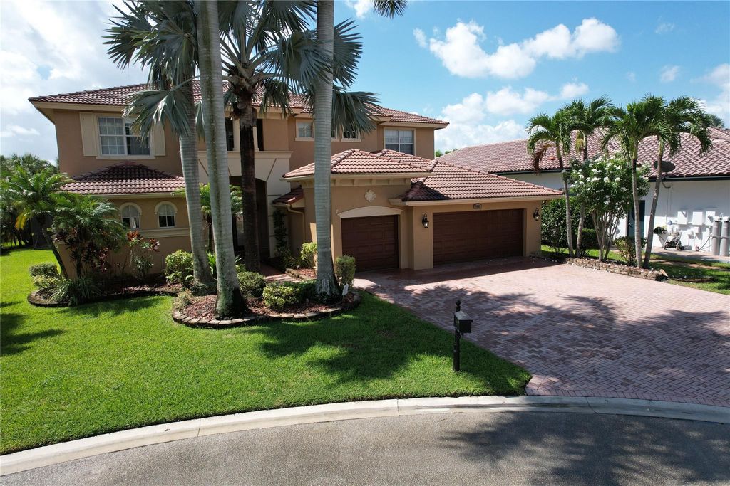 Photo of 7662 NW 127th Manor, Parkland, FL 33076 (MLS # F10472657)
