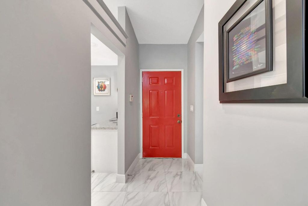 Photo of 10927 Dolphin Palm Court #A, Boynton Beach, FL 33437 (MLS # R11063033)