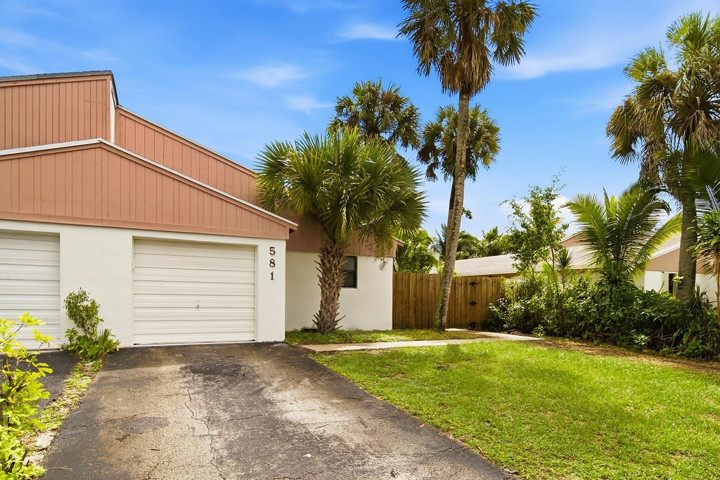 Photo of 581 NW 47TH Avenue, Delray Beach, FL 33445 (MLS # B26078341)
