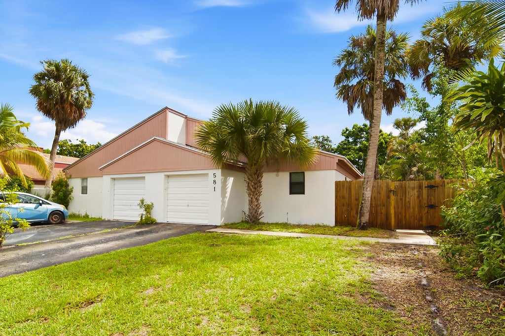 Photo of 581 NW 47TH Avenue, Delray Beach, FL 33445 (MLS # B26078341)
