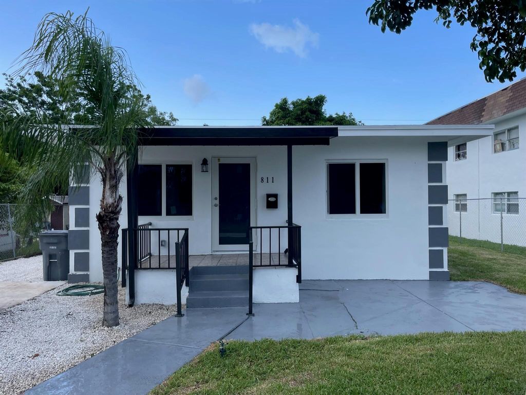 Photo of 811 Bayberry Drive, Lake Park, FL 33403 (MLS # R10906669)