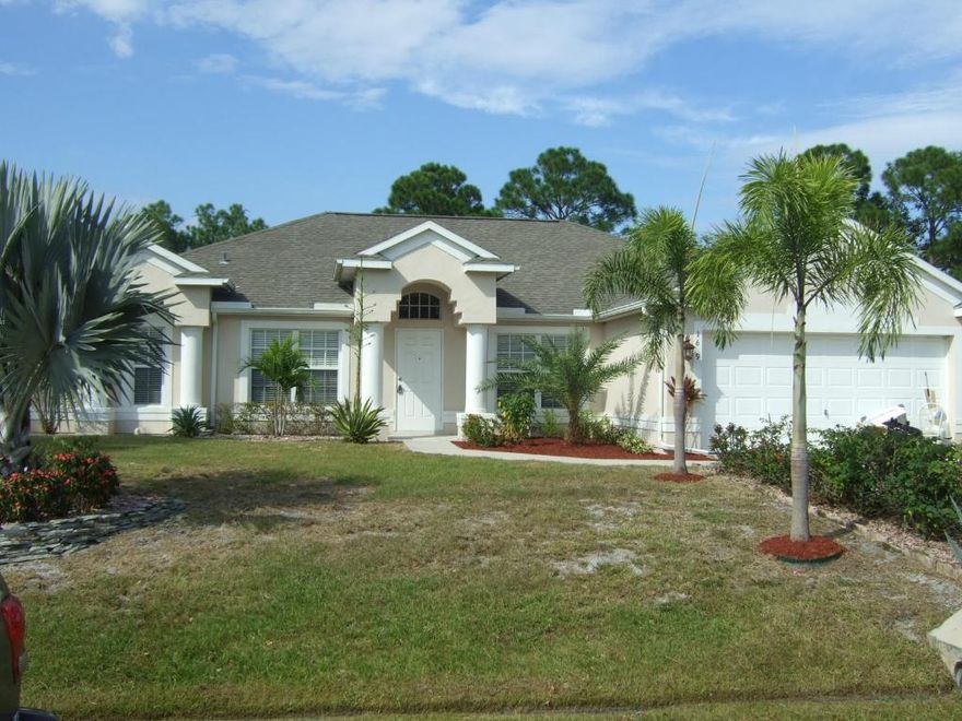 Spacious 4 BR rental in western PSL. Covered porch and private backyard setting. Easy access to St. Lucie West shopping and schools.