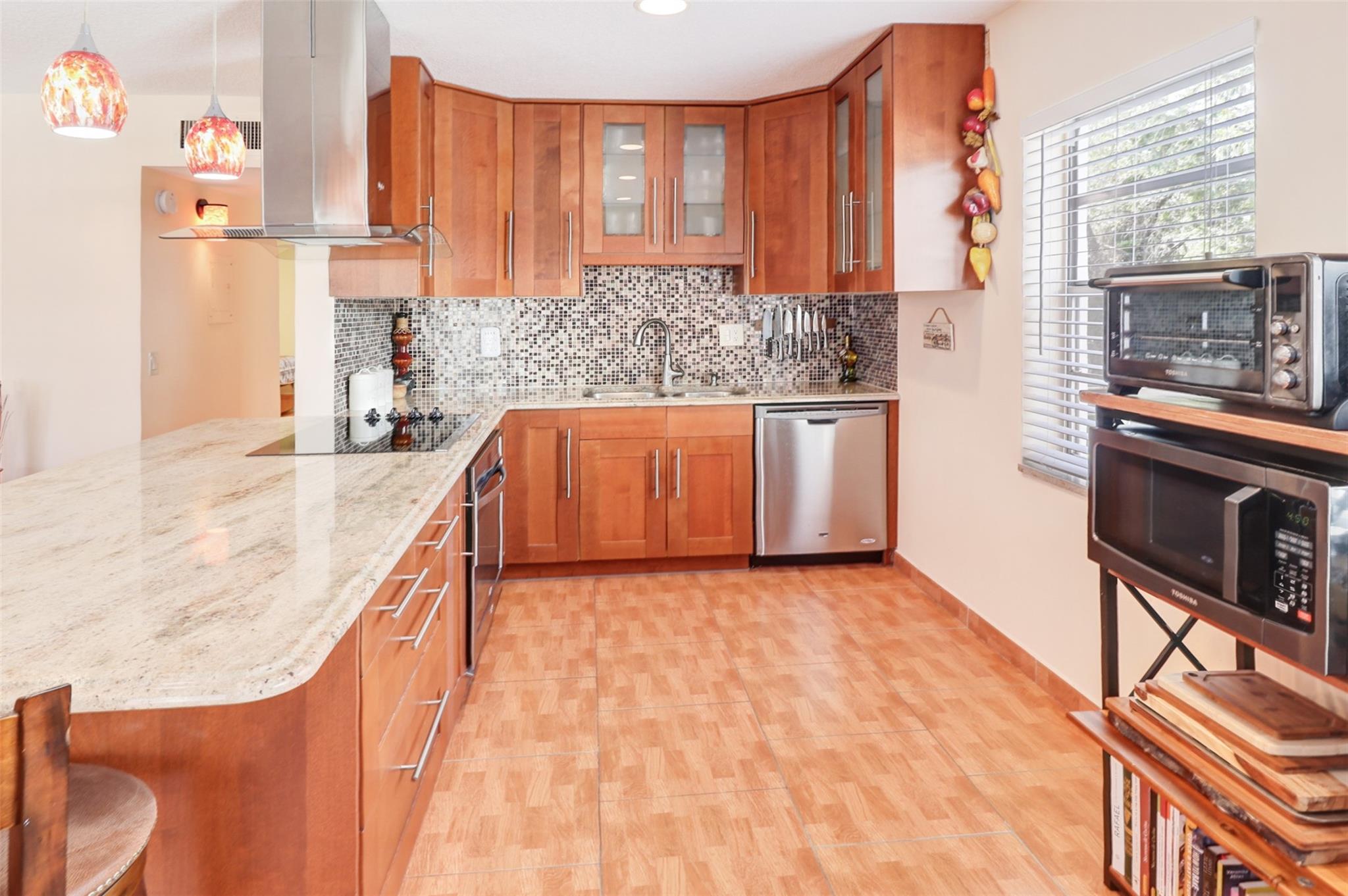 Welcome to this beautifully updated 2/2 condo in Kings Point community! This bright and spacious unit features tile floors throughout, a spectacular gourmet kitchen with ample cabinetry and pantry space, and a washer/dryer for added convenience. Enjoy the vibrant 55+ lifestyle with resort-style amenities, including: Two golf courses. Indoor and outdoor pools. Clubhouse and theater. Two fitness centers. Arts & crafts studios. Pickleball and tennis courts. Beauty salon and two on-site restaurants. Kings Point offers 24-hour security, transportation services. all just minutes from shopping, dining, and the beach. Association includes All Amenities, Common Area, Landscaping/Lawn Maintenance, Pool Service, Recreation Facilities, Reserve Fund, Roof Repairs, .Sewer, Trash Removal.