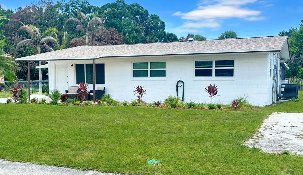 Photo of 1612 S 28th Street, Fort Pierce, FL 34947 (MLS # R11165075)
