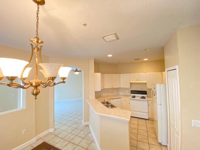 This condo has a highly desirable layout and exceptional use of space. It features 3 Bedroom floor plan with screened balcony on the 2nd Floor. Fully functional kitchen & dining areas are on the main level with Bedrooms upstairs. This unit is light & bright!