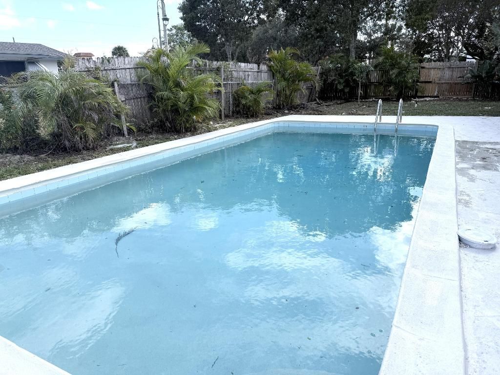 Photo of 210 W 23rd Street, Riviera Beach, FL 33404 (MLS # R11147037)