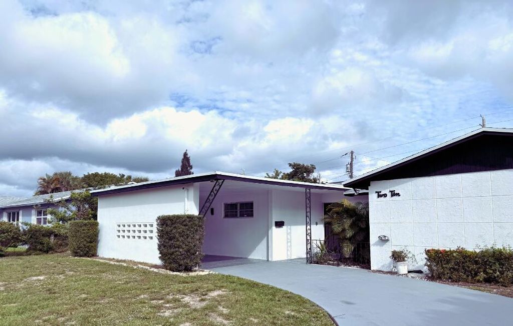 Photo of 210 W 23rd Street, Riviera Beach, FL 33404 (MLS # R11147037)