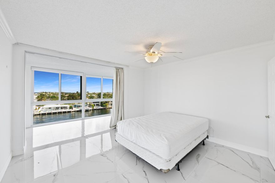 Desired, rarely available CORNER condo, directly on the INTERCOASTAL.  Offering a rare combination of privacy, light and breathtaking views. Enjoy panoramic views of the ocean above 3 story height restricted, Lauderdale By The Sea, and panoramic sweeping views of the intracoastal. Walking distance to the beach, and Lauderdale By The Sea Beach Town.  Common area dockage canal just off of a 12 month a year no wake zone section of the intracoastal waterway.  Newly renovated upscale modern open kitchen concept. Elegant new tile floors. Expansive floor-to- ceiling windows, frame truly one-of-a-kind views. Brand new central air conditioning unit. Garage parking, direct intracoastal heated swimming pool. Party room is currently being renovated. Small pets are welcome.