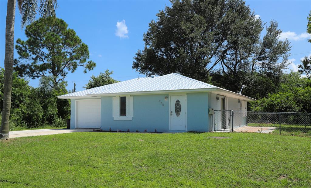 Photo of 980 SW Gwendolen Terrace, Port Saint Lucie, FL 34953 (MLS # R10744104)