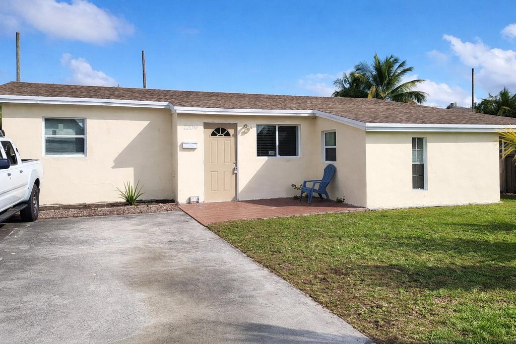 Photo of 2330 NE 1ST Avenue, Pompano Beach, FL 33060 (MLS # B26087065)
