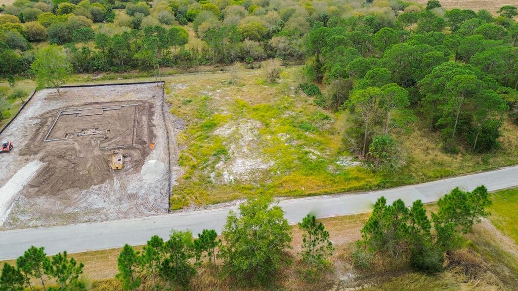 Photo of 10645 Lighter Wood Lane, Fort Pierce, FL 34945 (MLS # R11154327)