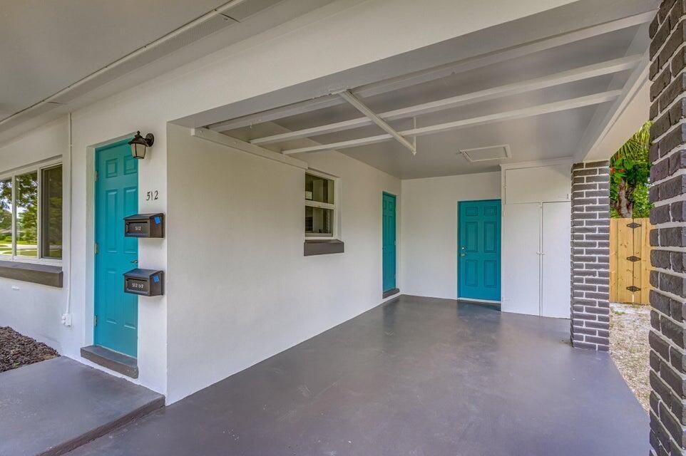 Photo of 512 BAYBERRY Drive, Lake Park, FL 33403 (MLS # B26068985)