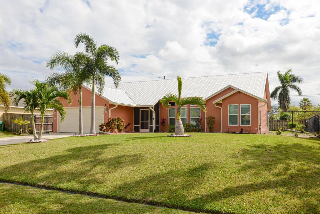 Photo of 1374 SW Wampler Avenue, Port Saint Lucie, FL 34953 (MLS # R11062219)