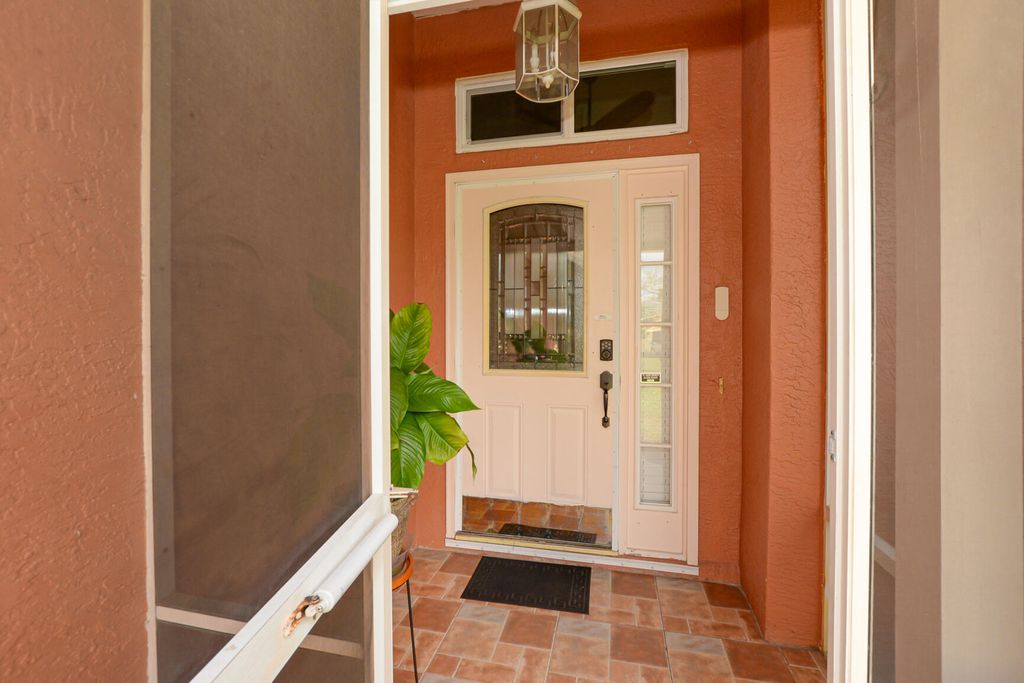 Photo of 1374 SW Wampler Avenue, Port Saint Lucie, FL 34953 (MLS # R11062219)