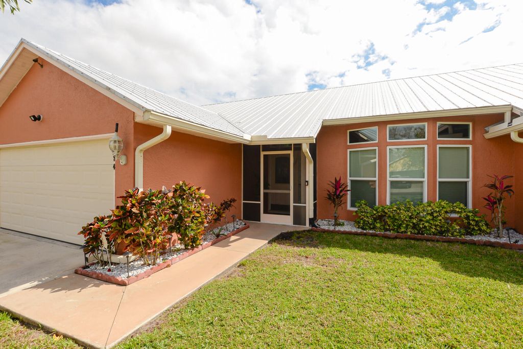 Photo of 1374 SW Wampler Avenue, Port Saint Lucie, FL 34953 (MLS # R11062219)