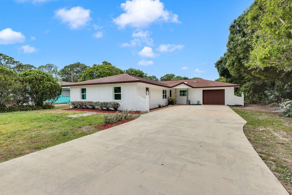 Photo of 5211 Palmetto Drive, Fort Pierce, FL 34982 (MLS # F10441263)