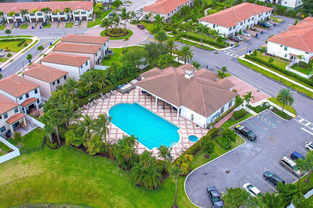 Photo of 2024 Sugar Maple Drive, Riviera Beach, FL 33410 (MLS # B26012031)