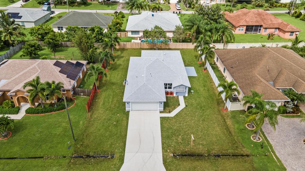 Photo of 543 SW Mccomb Avenue, Port Saint Lucie, FL 34953 (MLS # R11093318)