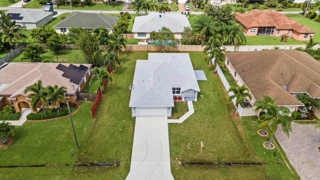 Photo of 543 SW Mccomb Avenue, Port Saint Lucie, FL 34953 (MLS # R11093318)